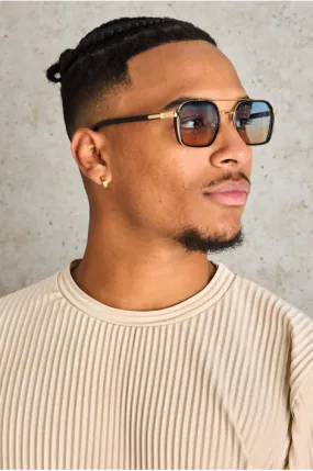 Lunettes noires et dorées carré à verres bleu et orange