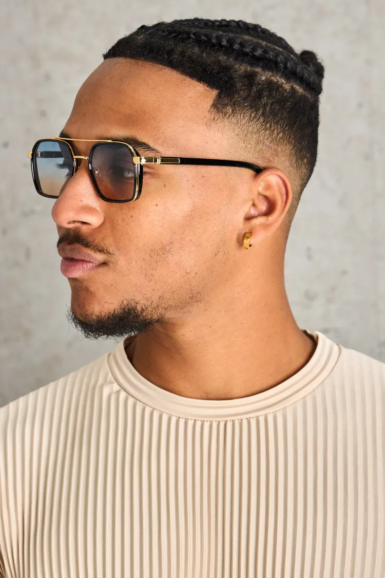 Lunettes noires et dorées carré à verres bleu et orange