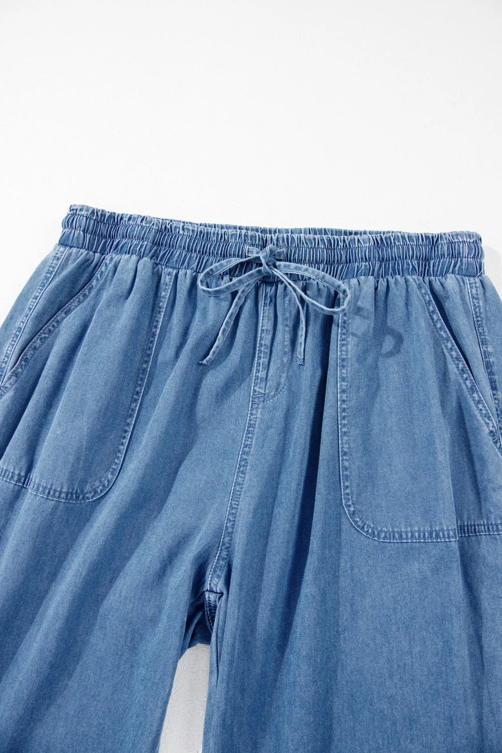 Pantalon de jogging en denim bleu crépuscule avec poches à la taille et cordon de serrage de grande taille